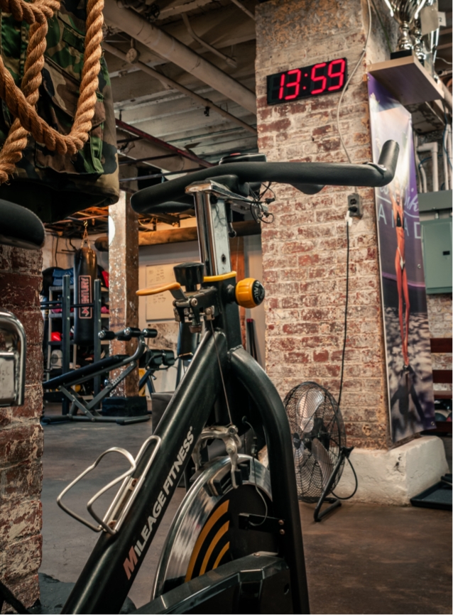 Private studio training wall with mats and equipment.
